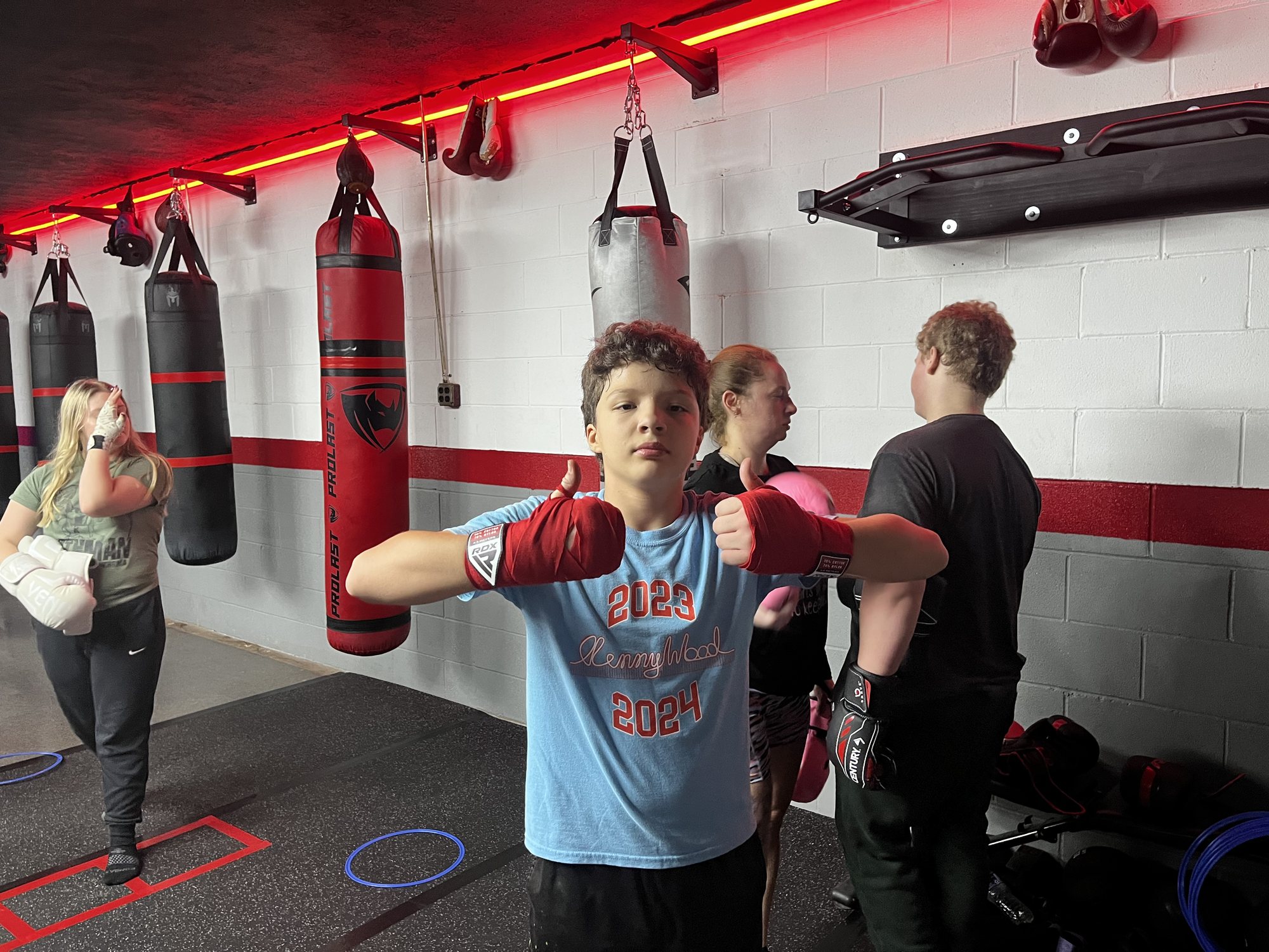 Getting hands wrapped before hitting the bags
