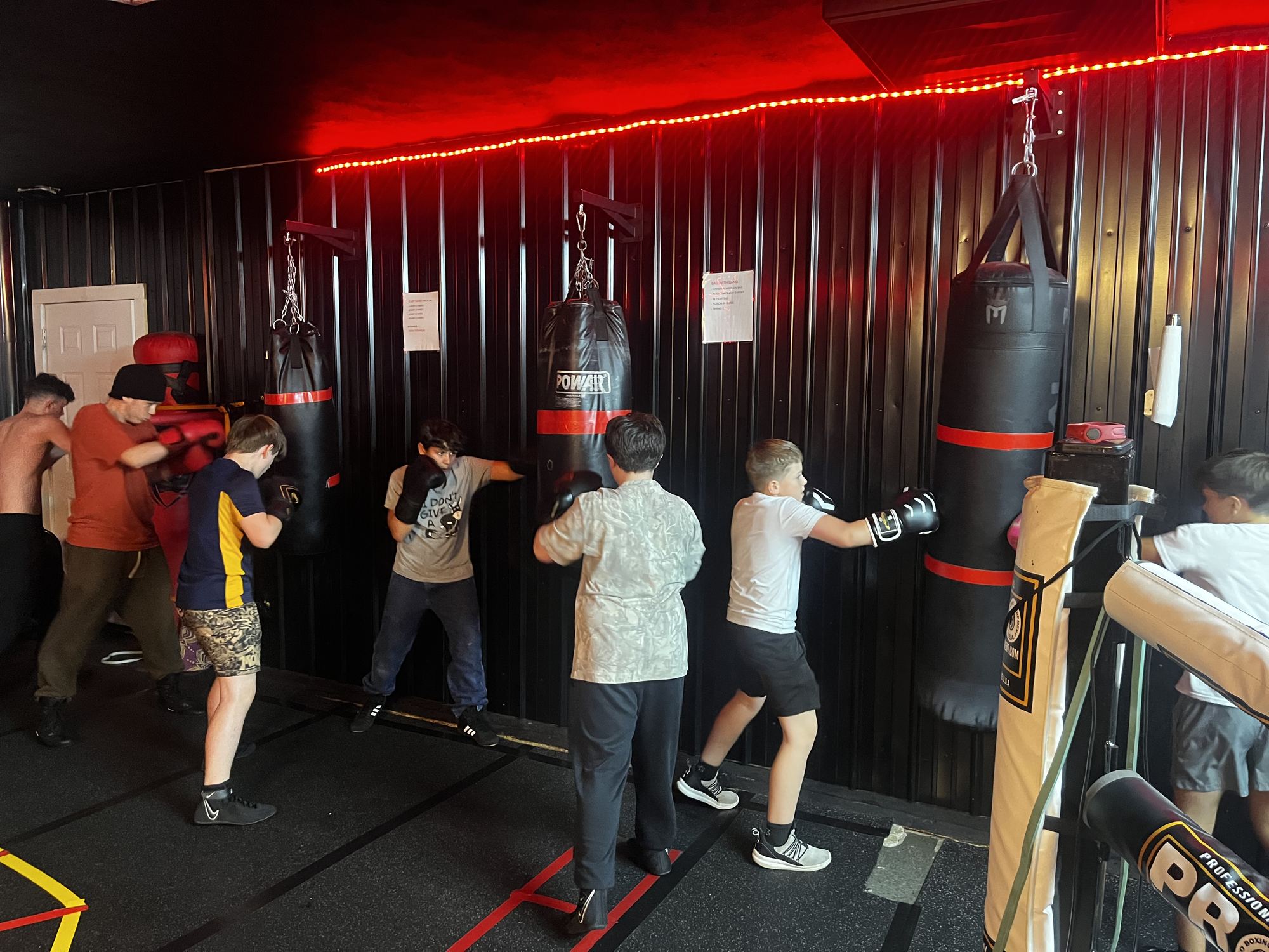 Working the heavy bags at Kings Hands